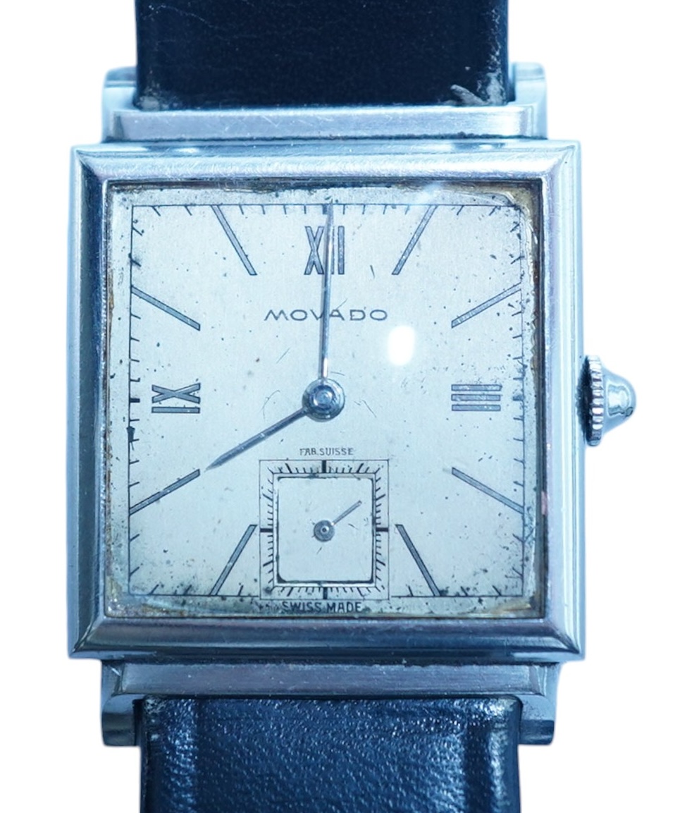 A gentleman's steel Movado manual wind square dial wrist watch, with Roman and baton numerals and subsidiary seconds, case diameter 25mm, on a later associated leather strap. Condition - poor